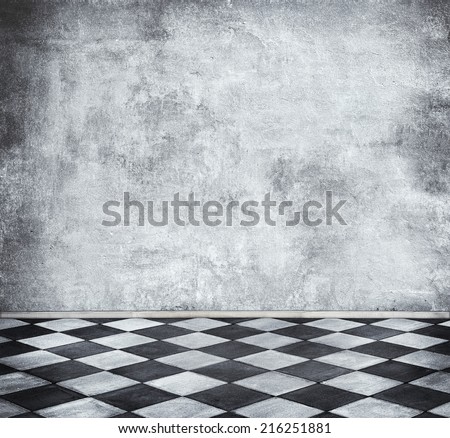 Old grunge room with tiled floor