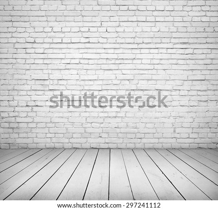 White brick wall and wooden floor interior