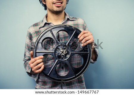 Hipster With Old 35mm Film Reel