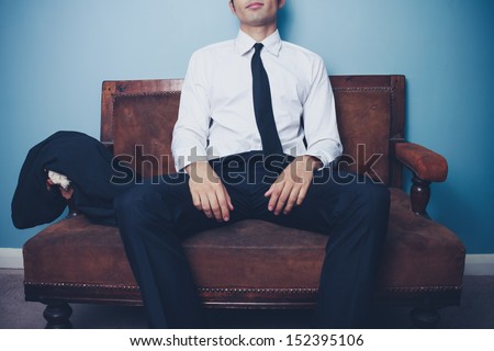 Businessman relaxing after long day at work
