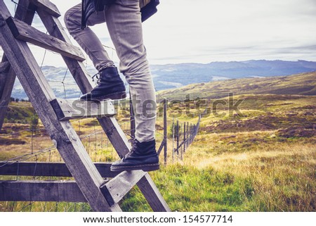 Hill walker crossing style and fence
