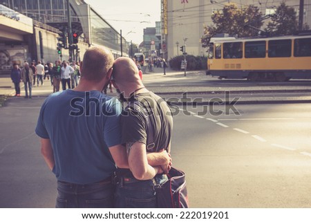 BERLIN, GERMANY - OCTOBER 3. Homosexual couple waiting to cross the road in East Berlin on October 3, 2014 in Berlin, Germany