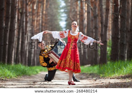Couple of dancers in russian national dress