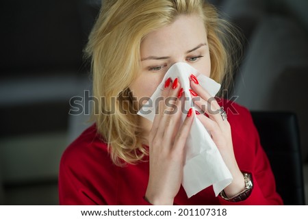 Girl cold flu illness tissue blowing runny nose or allergy