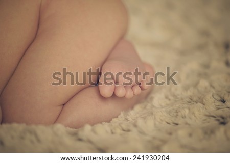 Small little foot and toes of newborn baby