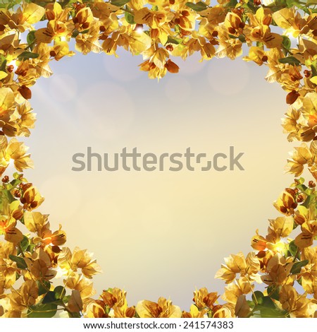Valentine\'s day card. Spring nature background with blooming flowers. Heart frame