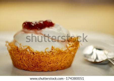 Whipped cream dessert with strawberry and Kadaif pasta