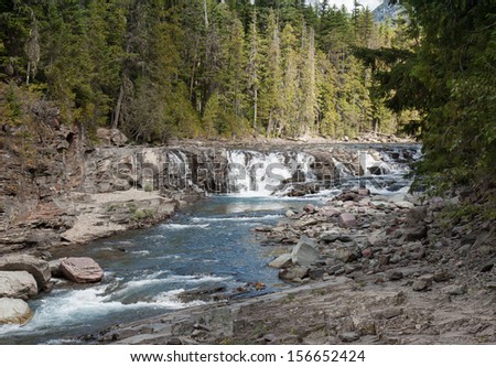 Small waterfalls and rapids are seen in this image from Glacier National Park.