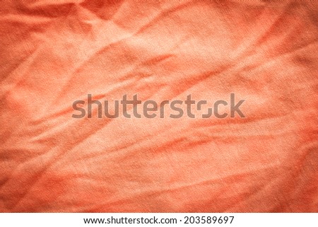 Orange cloth with wrinkles