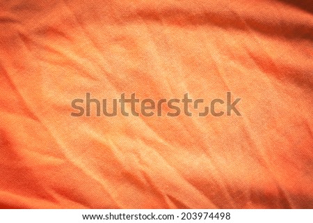 Wrinkled wrinkled orange cloth