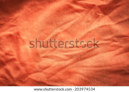 Wrinkled wrinkled orange cloth