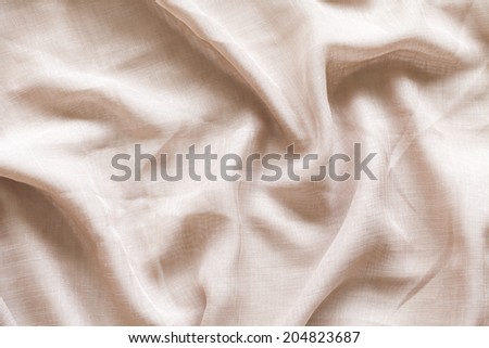 brown fabric unwrinkled background.