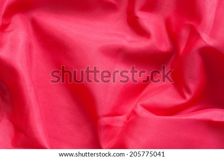 Red cloth with wrinkles background.