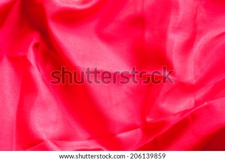 red wrinkled cloth background.