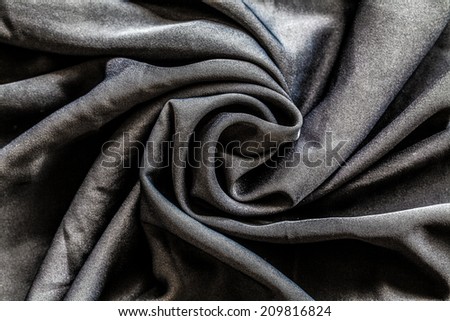 Black cloth with wrinkles together.