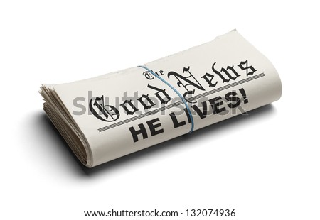 Newspaper With The Good News and the Headline He Lives printed on it Isolated On White Background Newspaper With The Good News and the Headline He Lives printed on it Isolated On White Background