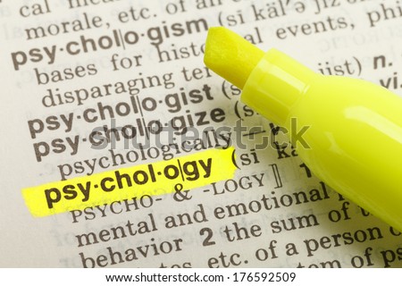 The Word Psychology Highlighted in Dictionary with Yellow Marker Highlighter Pen.