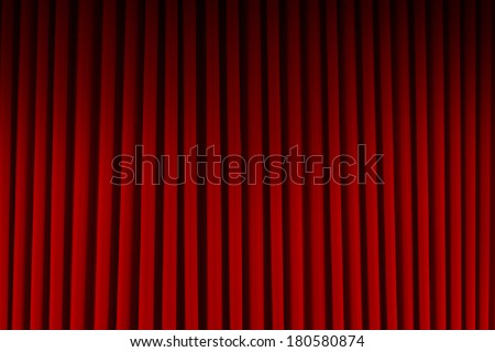 Red Velvet Stage Curtains Dim Lit Background.