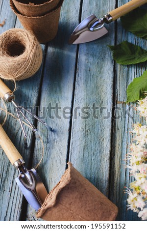 garden tools on a table from boards