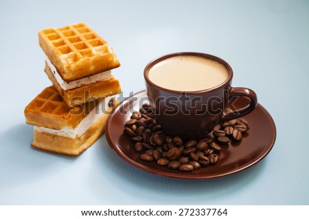 coffee and wafers on a table, selective focus