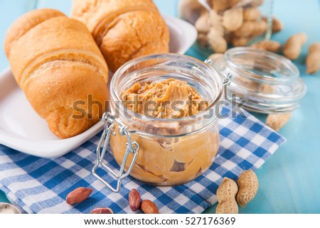 peanut paste and croissants on a table, selective focus