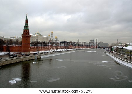 Winter snapshot of Moscow Kremlin, Kremlin embankment, Moscow River and the Kremlin\'s Wall with Spasskaya, Senatskaya and Nikolskaya towers - Moscow, Russia