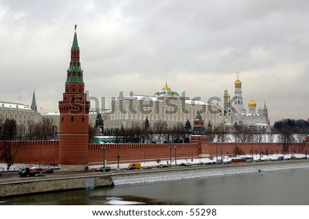 Winter snapshot of Moscow Kremlin, Kremlin embankment, Moscow River and the Kremlin\'s Wall with Spasskaya, Senatskaya and Nikolskaya towers - Moscow, Russia