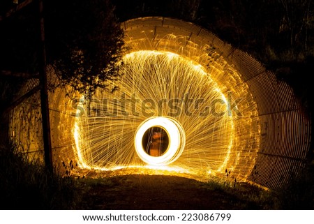 Fire Sparks Steel Wool Photography In Railway Tunnel