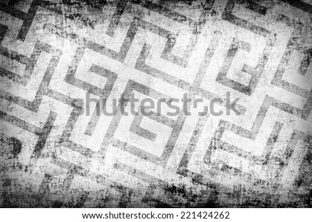Labyrinth pattern on the textured grunge background. Horizontal composition with dimmed edges.