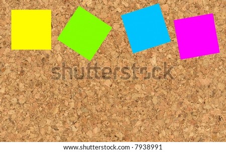 sticky notes on a cork-board