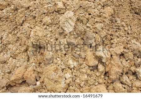 close up wet brown clay texture