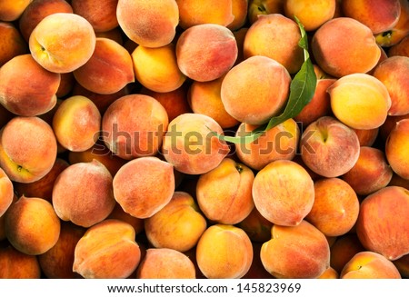 Fresh ripe peaches background