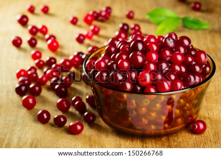 Fresh ripe red cranberries in glass dish