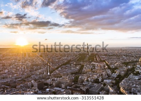 Beautiful aerial view of Eiffel Tower and Paris roofs at sunset HDR