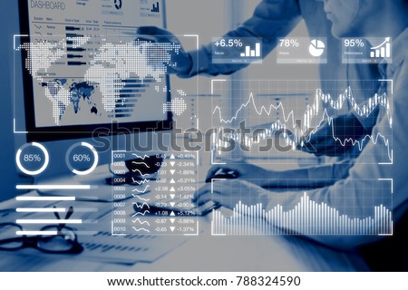 Business analytics dashboard reporting concept with key performance indicators (KPI) and two people analyzing sales or digital marketing data on computer screen in background