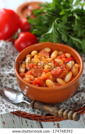 bean with sweet pepper, tomatoes and smoked sausages