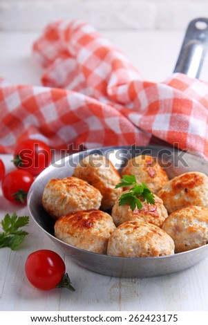 meat balls (cutlets) from turkey meat in a frying pan