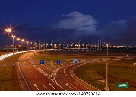 ST-PETERSBURG, RUSSIA - SEPTEMBER 17: Ringway St Petersburg, September 17, 2009. The mast lighting on the night road. Electric lights in the night highway. Road lighting lanterns. Russian roads.