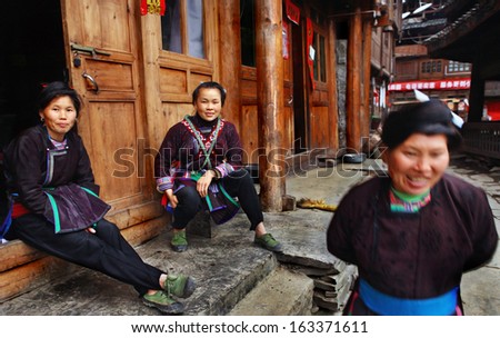 GUIZHOU PROVINCE, CHINA - APRIL 12: Chinese woman in traditional clothes of ethnic minorities in China, people Dong, April 12, 2010. Zengchong Dong ethnic minority Village, Guizhou, Southwestern China