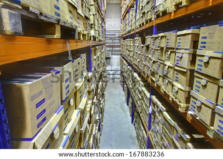 SAINT-PETERSBURG, RUSSIA - DECEMBER 3: Interior warehouse storage of archival documents, shelf racks with boxes, December 3, 2013.