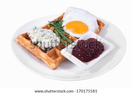 Breakfast on the plate, Belgian waffles with fried egg, cream cheese with dill, and cherry jam, isolated image on a white background, no body.