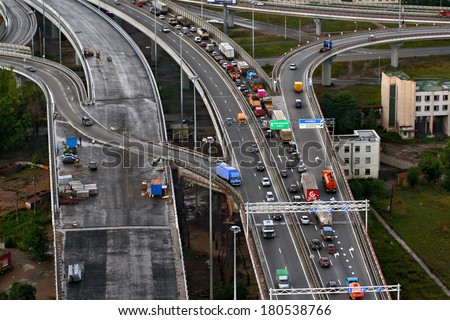 ST-PETERSBURG, RUSSIA -  AUGUST 31, 2007:  Plan view of a circular intersection, ring motorway around Saint Petersburg. Bird's-eye view at the roundabout intersection ring road and industrial area.