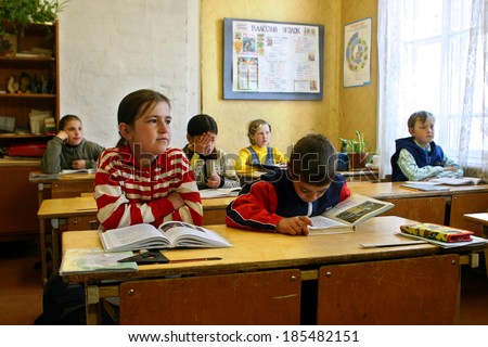 TVER, RUSSIA - MAY 2, 2006: Classroom with pupils in Russian ungraded rural school. School class with schoolchildren in small country school