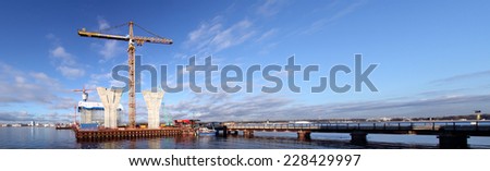 St. Petersburg, Russia - October 30, 2014: Construction western high speed diameter. Building Cable-stayed bridge across  ship fairway. Temporary technological platforms and overpass in  Gulf  Finland