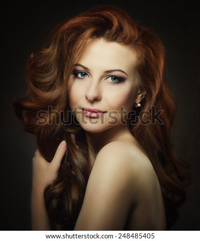 Portrait of a beautiful young woman with gorgeous red hair Red hairstyle
