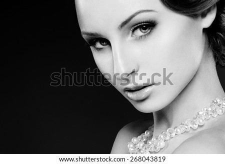 Black and white fashion photography of a beautiful young woman