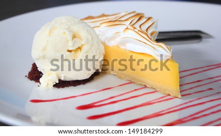 Slice Of Lemon Meringue Pie with Ice Cream