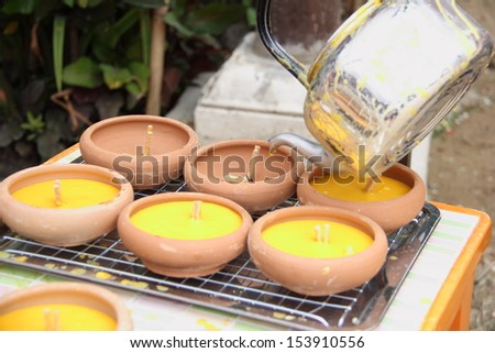 Making of candle at Thai temple