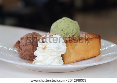 Honey toast and whipping cream with ice cream