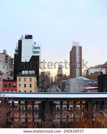 NEW YORK CITY - DECEMBER 25: New York Cityscape seen from High Line Park on December 25, 2013. The High Line is a public park built on an historic freight rail line elevated above the streets.